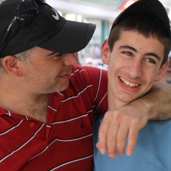 father-and-teen-son-affectionate-happy-561
