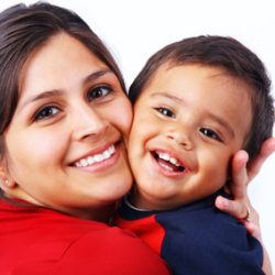 Happy Mother Hugging Son Tightly