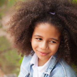 Outdoor portrait of a beautiful little girl