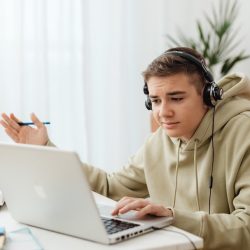 teen-boy-laptop-headphones-puzzled-struggling-student-exec-function-272