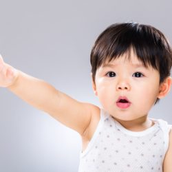 Baby with finger point to front