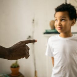 young boy scolded by parent anxious 1071
