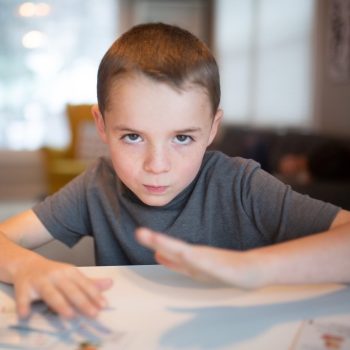 young-boy-unsettled-unhappy-upset-1262