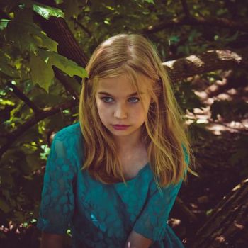 young-girl-serious-unhappy-outdoors-155