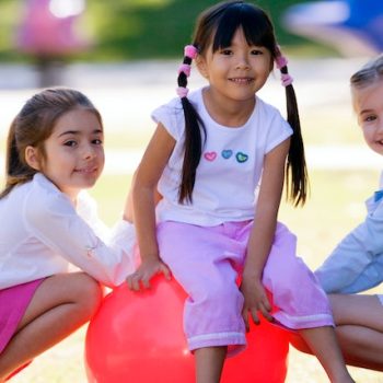 young preschool elementary playing with ball 530