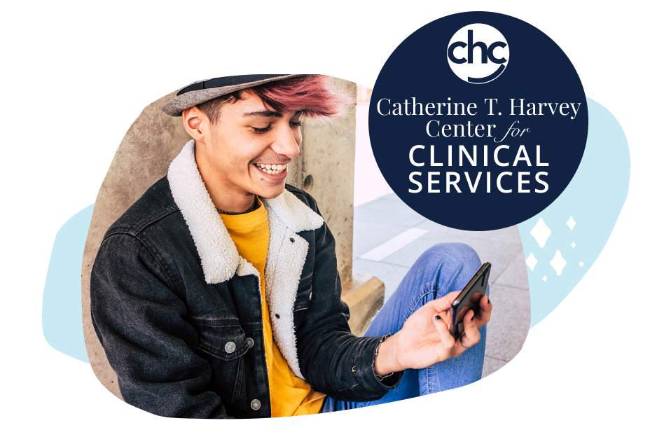 CHC Catherine T. Harvey Center for Clinical Services. Photo of young male student smiling and looking at his phone